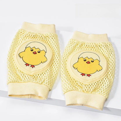 Pair of yellow mesh knee pads with cartoon chick design on a white background
